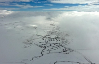 Kars'ta karla kaplı köyler ile menderesler havadan görüntülendi